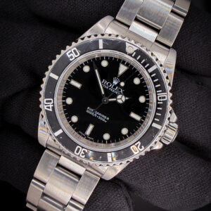 2000 (P-Serial) Rolex 14060 Submariner "No-Date" in a 40mm stainless steel case, powered by the Rolex caliber 3000 automatic movement. This Submariner has been tested in good working order and is ready for wear or to be added to a collection. Case Serial Number: P311XXX Accuracy Testing: -1SPD / 290 Amplitude / .2ms Beat Error