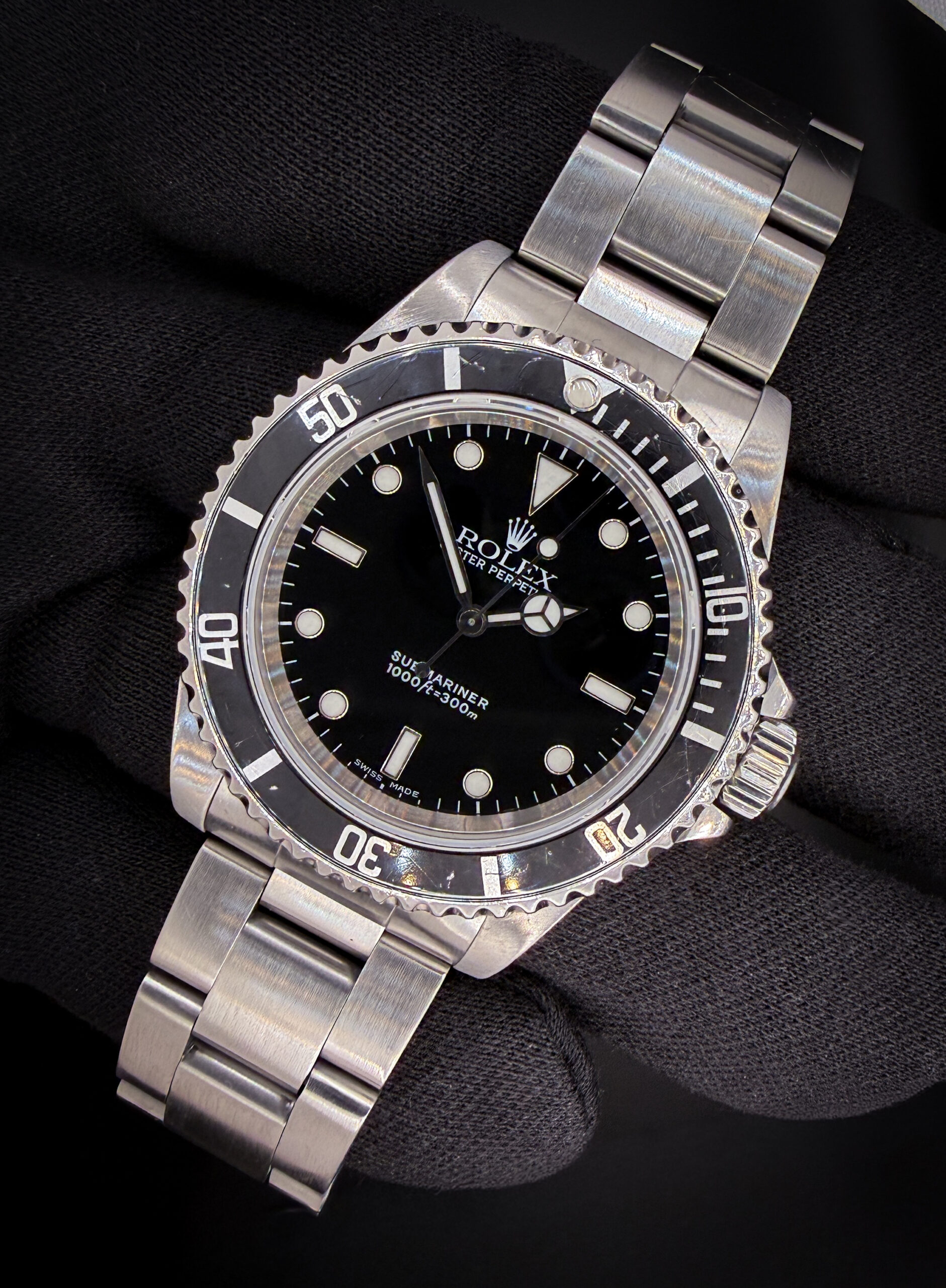 2000 (P-Serial) Rolex 14060 Submariner "No-Date" in a 40mm stainless steel case, powered by the Rolex caliber 3000 automatic movement. This Submariner has been tested in good working order and is ready for wear or to be added to a collection. Case Serial Number: P311XXX Accuracy Testing: -1SPD / 290 Amplitude / .2ms Beat Error