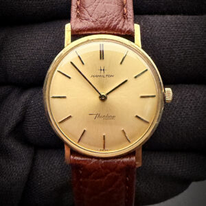 1960's Vintage Hamilton "Thinline" in a 33mm in a 10k Gold-Filled case, powered by the Hamilton 687A hand-wound 17-Jewel movement. This Hamilton has been tested in good working order and is ready to wear or to be added to a collection.  Interior Caseback Serial Numbers: J82774 / 921465