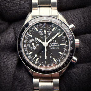 Vintage Omega Speedmaster Day-Date 3520.50.00 in a 39mm stainless steel case, featuring the Omega calibre 1151 automatic movement. This Speedmaster has been tested in excellent working order and is ready for wear. Includes: Omega outer box; inner leatherette case; wallet; instruction book; hang tag (matching serial); and warranty card.  Accuracy Testing: +/-3 SPD / 294 Amplitude / .1ms Beat Error Case Serial number: 57308XXX