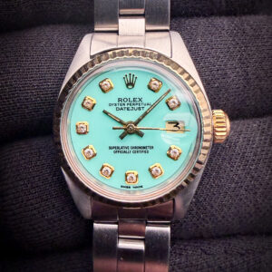 1978 Rolex Oyster Perpetual Date Ref. 6917 in a 26mm stainless steel case, with gold fluted bezel, powered by the Rolex caliber 2030 automatic movement. This Rolex has been tested in good working order and is ready for daily wear. Case Serial Number: 5444XXX