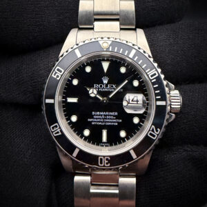 1997 Rolex Submariner Date 16610 (U-Serial) in a 40mm stainless steel case, with a "Swiss Only" Dial, powered by the Rolex caliber 3135 automatic movement. This Submariner includes a new Wrist Wraith travel case and the TLC Warranty/authentication card. Accuracy Tested: +/-5 Spd / 295 Amplitude / 0.1ms Beat Error Serial Number: U9109XX