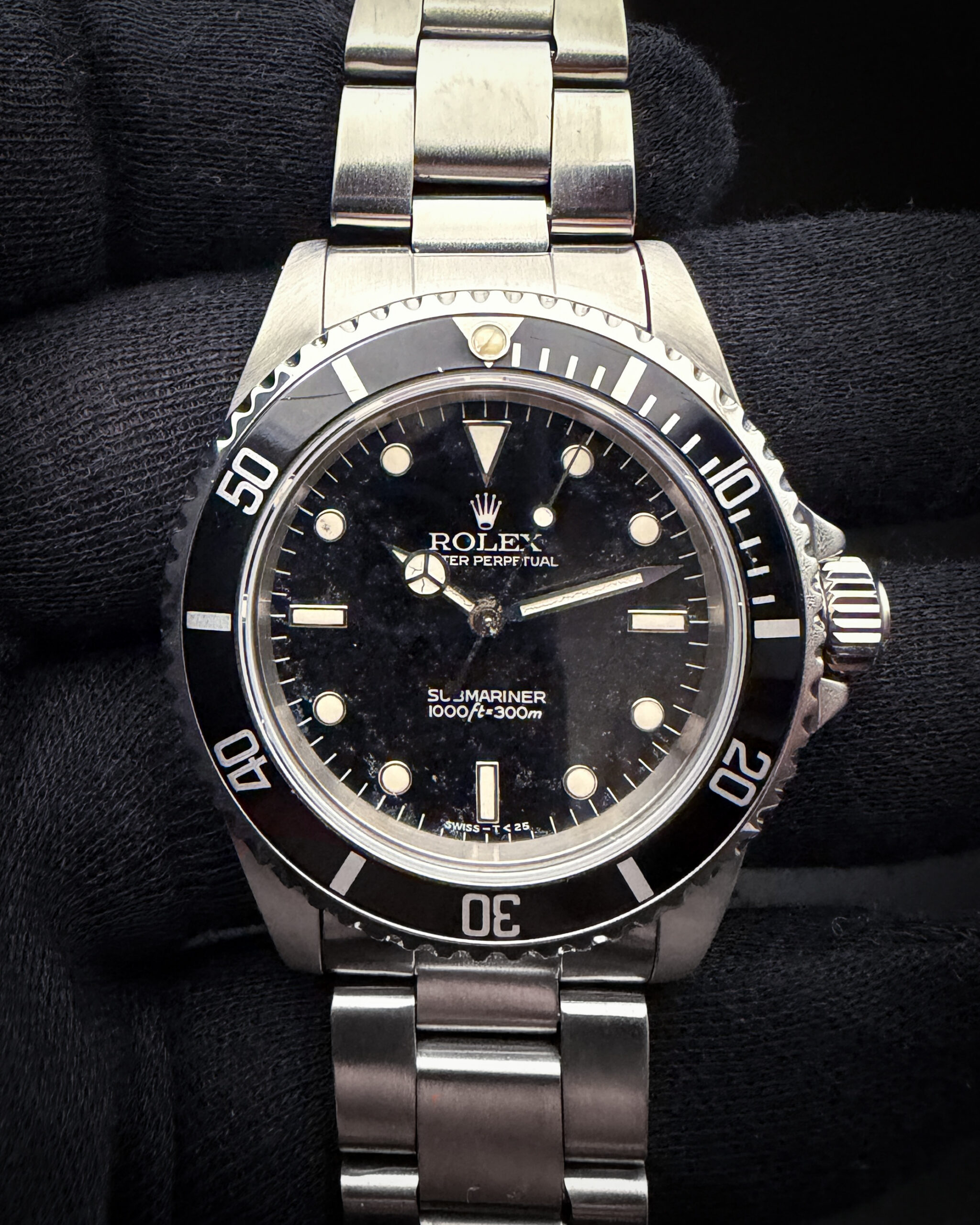 1996 (T-Serial) Rolex 14060 Submariner "No-Date" in a 40mm stainless steel case, powered by the Rolex caliber 3000 automatic movement. This Submariner was serviced August, 2026. It has been tested in excellent working order and is ready for wear or to be added to a collection. Includes a new Wrist Wraith Travel roll and a TLC Warranty/Authentication Card. Case Serial Number: T226993 Accuracy Testing: -+/-4SPD / 264 Amplitude / .2ms Beat Error