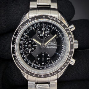 2008 Omega Speedmaster 40 Day-Date Triple Calendar 3220.50, in a 40mm stainless steel case, powered by the Omega 3606 automatic chronograph. This Speedmaster has been tested in excellent working order and is ready for wear or to be added to a collection. Includes a new Wrist Wraith travel case and our TLC Warranty & Authentication card. Accuracy Testing: +2 SPD / 278 Amplitude / .3ms Beat Error The bracelet has four (4) removable links currently installed and will fit up to an 7.25 inch wrist.