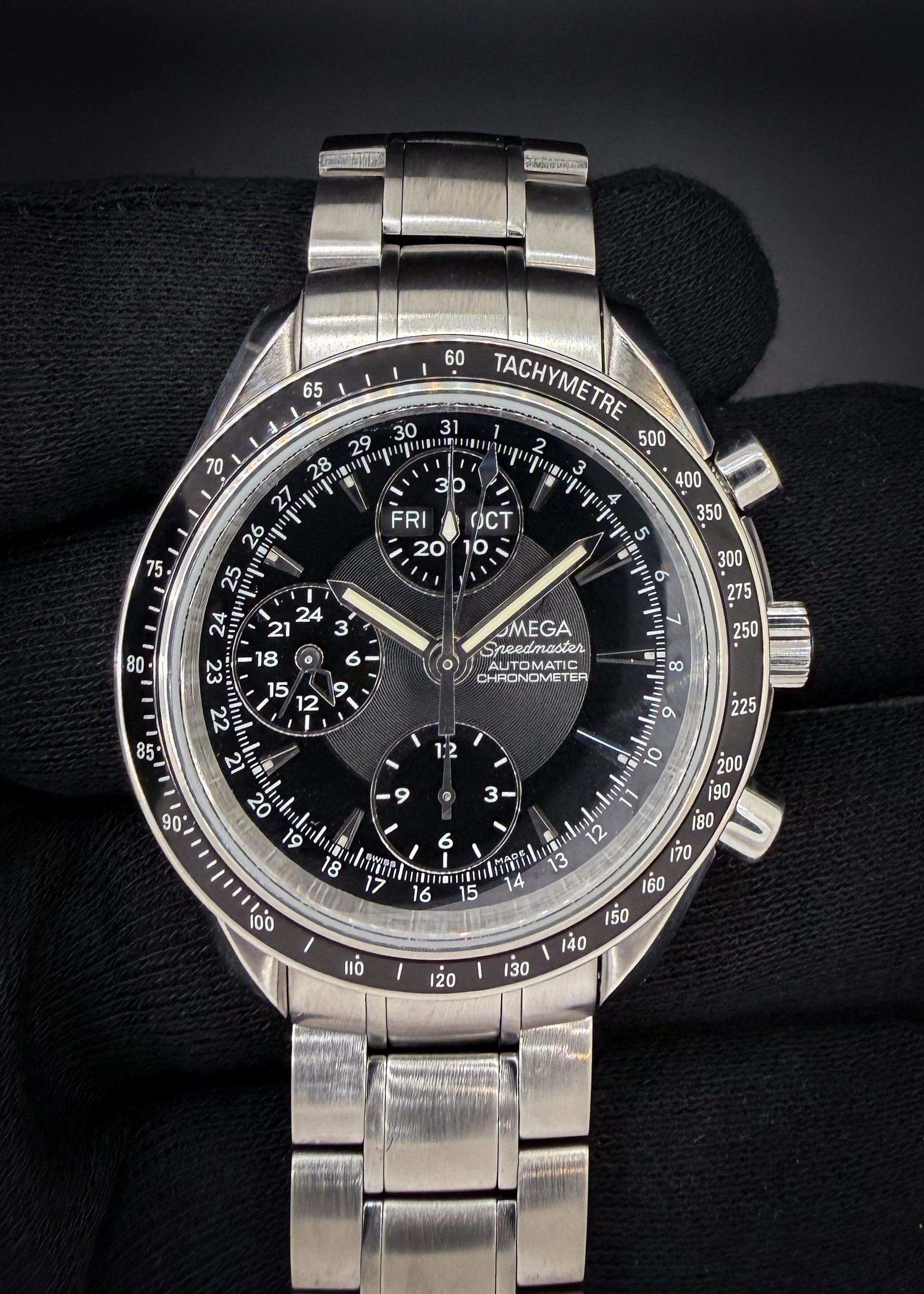 2008 Omega Speedmaster 40 Day-Date Triple Calendar 3220.50, in a 40mm stainless steel case, powered by the Omega 3606 automatic chronograph. This Speedmaster has been tested in excellent working order and is ready for wear or to be added to a collection. Includes a new Wrist Wraith travel case and our TLC Warranty & Authentication card.  Accuracy Testing: +2 SPD / 278 Amplitude / .3ms Beat Error The bracelet has four (4) removable links currently installed and will fit up to an 7.25 inch wrist. 