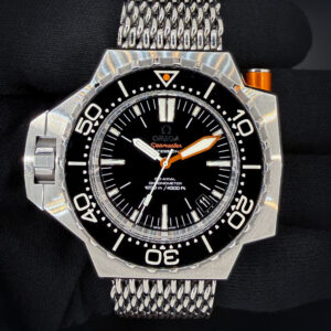 Omega Seamaster Professional PloProf 224.30.55.21.01.001 in a 55x48mm stainless steel case, powered by the Omega Co-Axial caliber 8500. This Omega has been tested in excellent working order and is ready for wear or to be added to a collection. Includes the original outer box, inner case, booklet, leatherette wallet, both hang-tags; Chronometer Certificate; Pictogram Card; and Warranty Card (dated 2009/11/16). This PloProf is paired with the original "SharkProof" stainless steel bracelet with micro-adjusting folding buckle. The bracelet has six (6) removable links currently installed and will fit up to a 9-inch wrist.