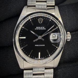 1983 Rolex Oyster Date Precision 6694 in a 34mm stainless steel case, featuring the Rolex calibre 1225 hand-wound movement. This Rolex was serviced in October 2026 and has been testing in excellent working order.  Accuracy Testing: +1 SPD / 278 Amplitude / .1ms Beat Error Case Serial Number: 7635XXX